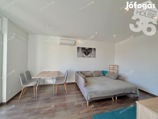 NAPFÉNYES, ERKÉLYES LAKÁS A BATTHYÁNY UTCÁN!