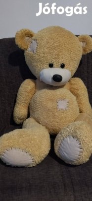 Nagy sárga plüss maci