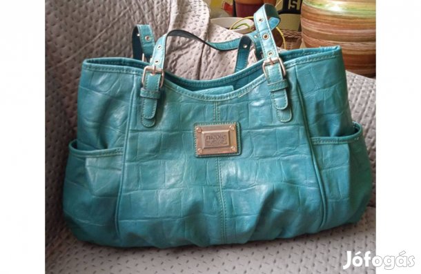 Nicole türkiz színű, pakolós, bőr válltáska