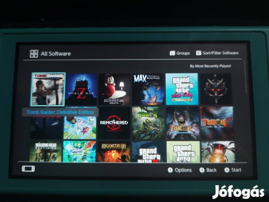 Nintendo switch lite okositott sok játékkal eladó