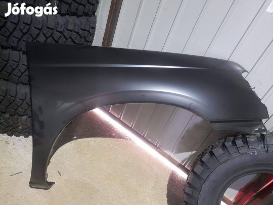 Nissan D22 Navara első sárvédő panel