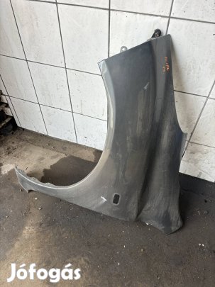 Nissan Micra K12 bal sárvédő grafit szürke 