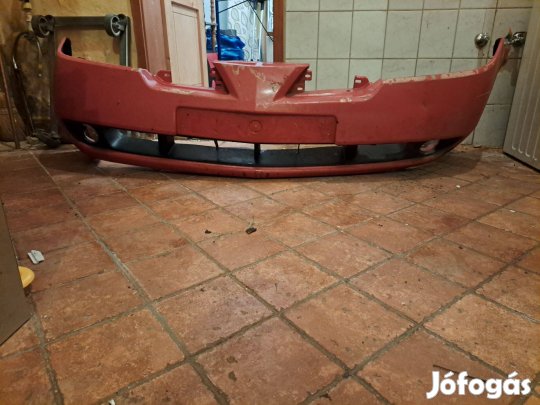 Nissan Primera P12 2002-2007-ig gyári első lökhárító eladó ára 15000Ft