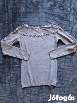 Női kötött pulóver