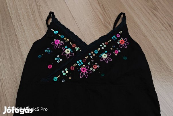 Női top színes gombokkal