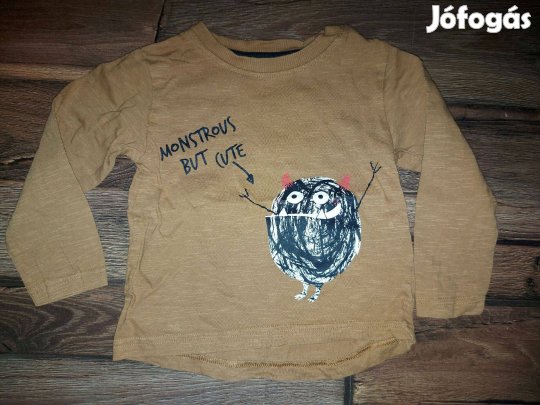 Oldalt csíkos kék színű esőnadrág Hossz: 88 cm Szélesség: 28-40 cm 140