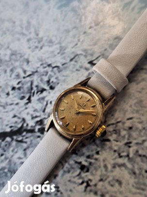 Omega koktélóra vastagon aranyozott tokban 