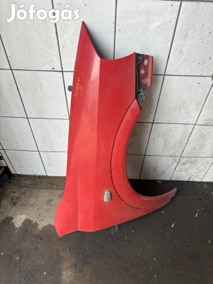 Opel Astra G jobb első sárvédő piros 