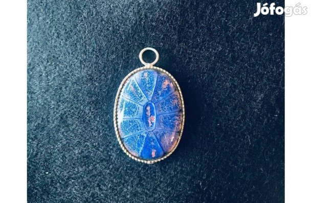 Ovális gyönyörű kék mintás medál 2 x 1,5 cm eladó!