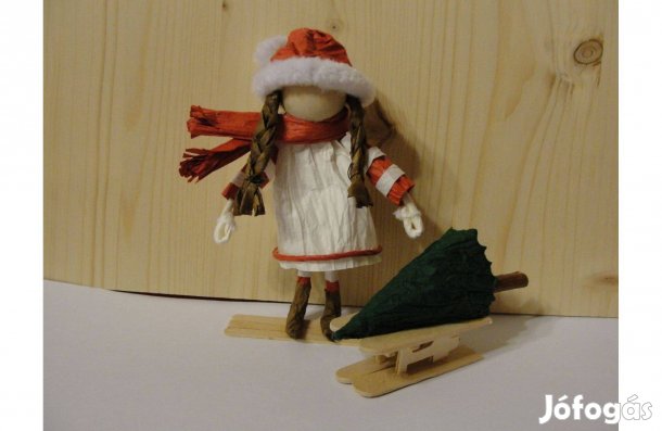 Papír manólány szánkóval és fenyővel