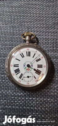 Paraszti motívumos, ezüst tokos svájci zsebóra eladó