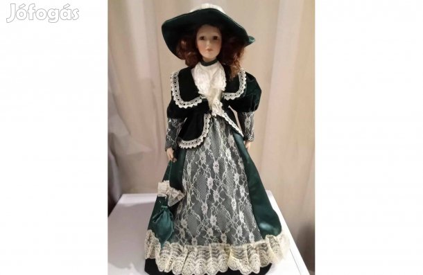 Porcelán baba 57 cm tartó állványon eladó!