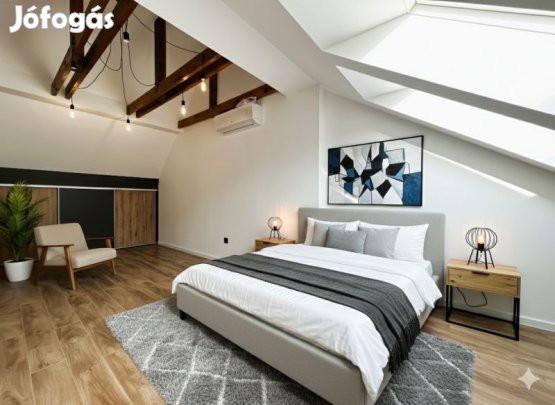 Prémium tetőtéri lakás kertkapcsolattal a Mecsek-oldalon