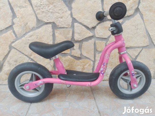 Puky rózsaszín kislány fútobicikli. 