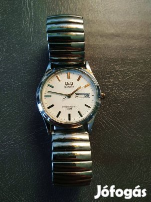 Q&Q női karóra - ezüst színű gumis szíjjal - javításra, alkatrésznek