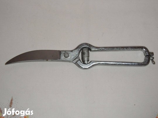 Régebbi fém baromfiolló