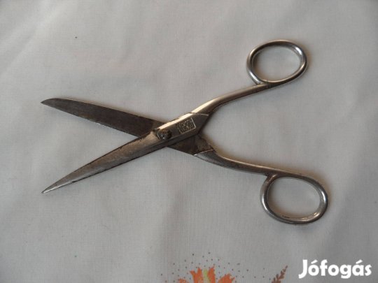 Régebbi jelzett fém olló