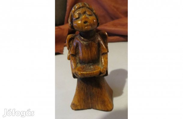 Régi fából faragott angyal alakú gyertyatartó