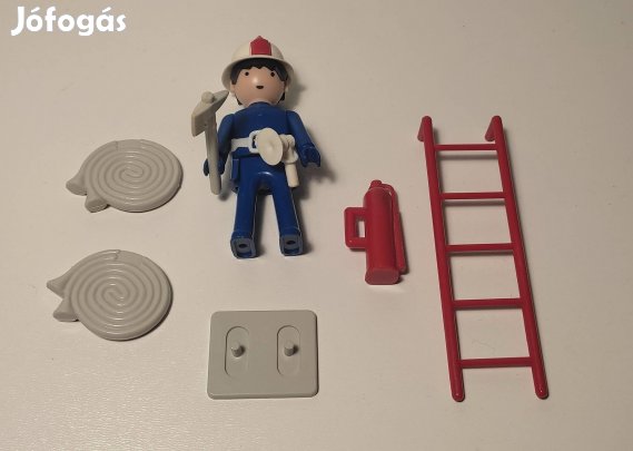 Régi műanyag Igra játék tűzoltó figura