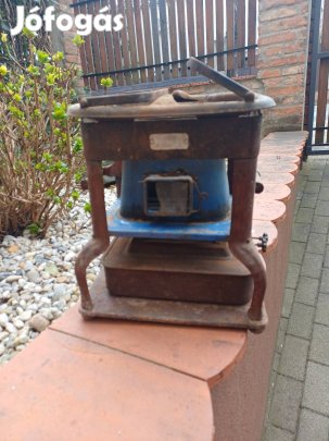 Régi sütő-melegítő eszköz.