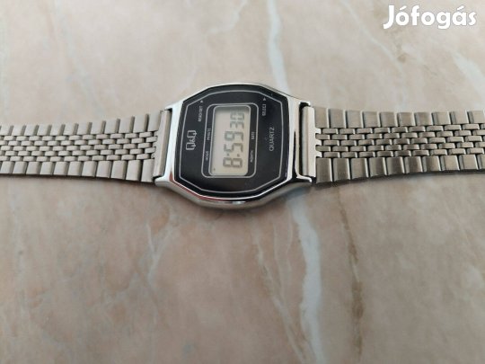 Régi szép állapotban Q & Q quartz karóra