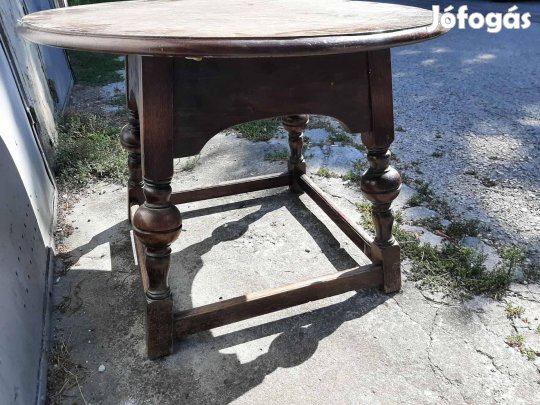 Régi tömörfa körasztal faragott lábakkal