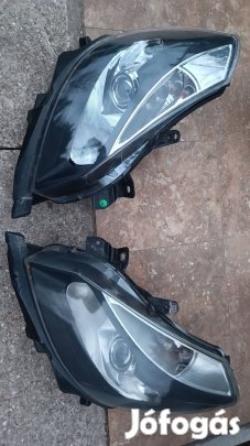 Renault Clio 3 kanyarkövető fekete hátteres fényszóró lámpa pár