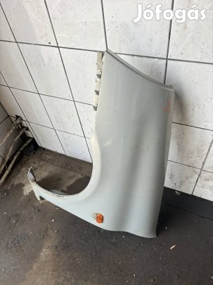 Renault Clio Thália bal sárvédő világos szürke 