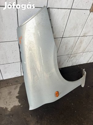 Renault Clio Thália jobb sárvédő világos szürke 