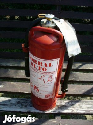 Retro régi poroltó porral oltó tűzoltó készülék plombájával, papírral