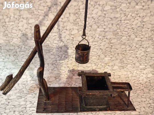 Rézöntvény gémeskút