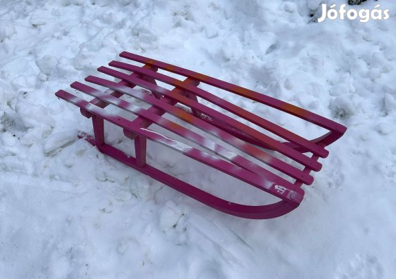 Rózsaszínű szánkó eldó