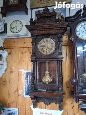 Rugóhuzamú negyedütős falióra 