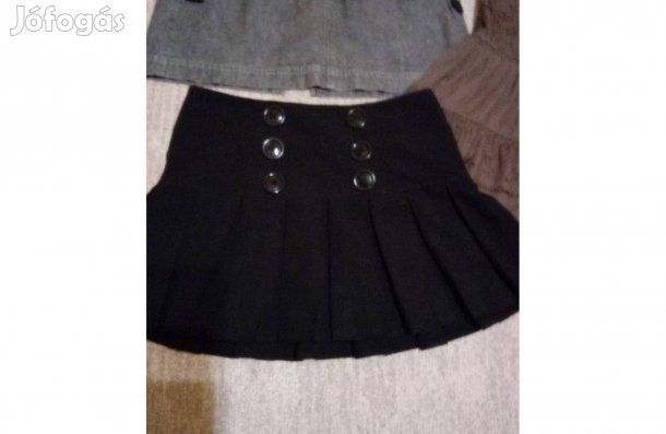 S 158 164 Újszerű fekete rakott mini csípőszoknya