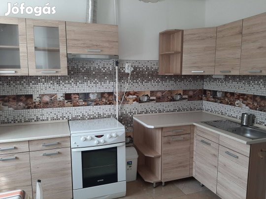 Sarok konyhabútor elszívóval + étkező garnitúra Bp.XII.ker