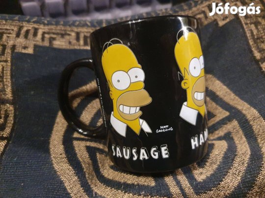 Simpson bögre +ajándék Simpson hűtőmágnes -15 db