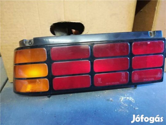 Suzuki Swift hátsólámpa bal (3/5) 1989 -> 1995 fekete csíkos