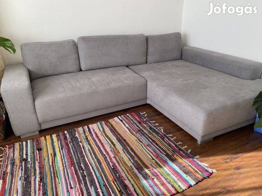 Szürke kanapéágy ágyneműtartóval