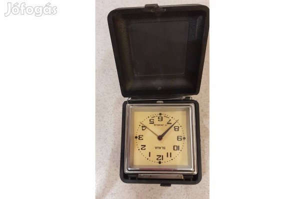 Tokozott hagyományos szerkezetű ébresztőóra utazóóra