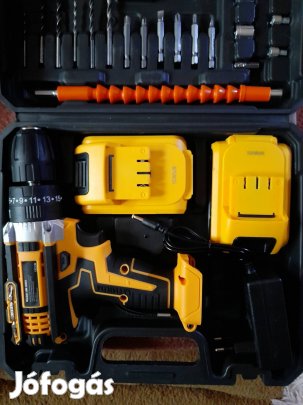 Új, müanyag táskában, ütvefúró-csavarozógép.