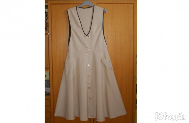 Új, női kötényruha, 52 -es. Szép, hosszú, végig gombos, zsebes