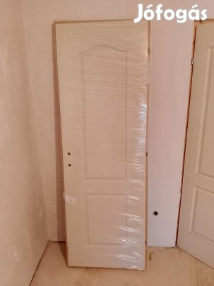 Új ajtó bontatlan eladó.