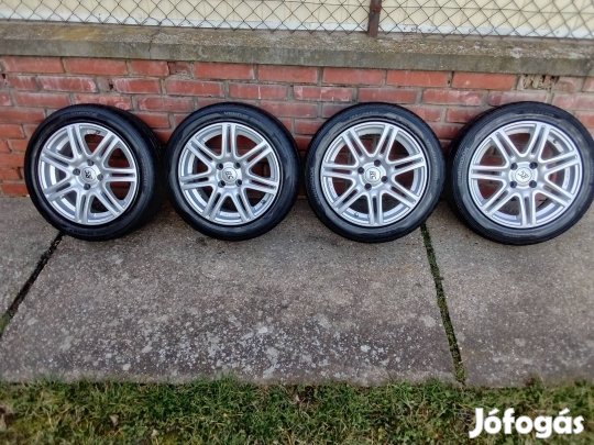 Új állapotú alufelni garnitúra újszerű nyári gumikkal