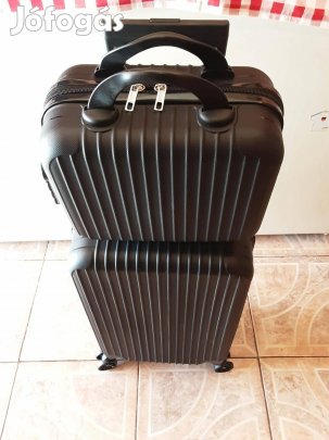 Új gurulós bőröndszett merevfalú 54cm+20cm fekete mindkét táskán számz