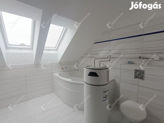 Újépítésű belvárosi lakás dupla garázzsal és tárolóval