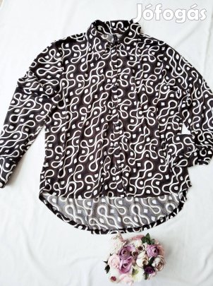 Újszerű csinos fazonú Amisu XL méretű női felső