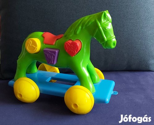 Újszerű guruló ló 6 db formabeillesztővel 