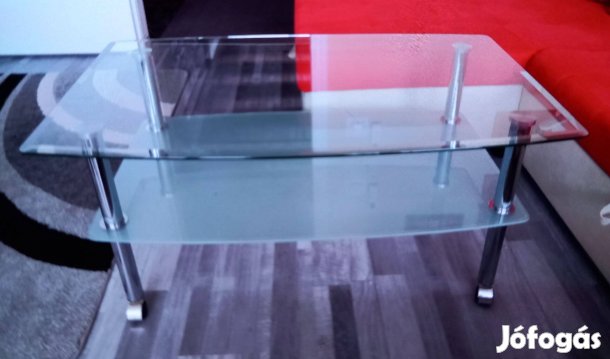 Üveglapos asztal irányárral