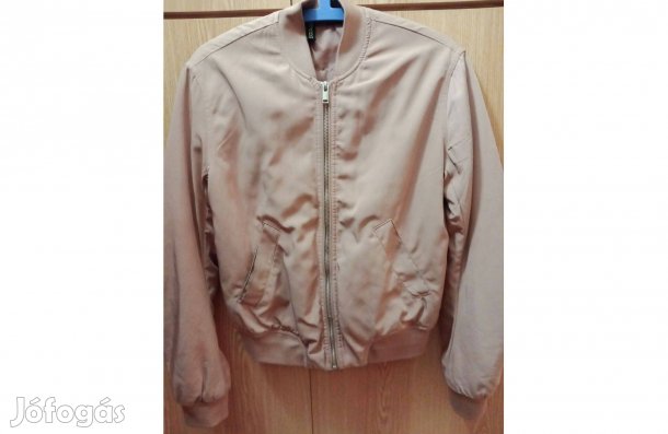 Világos mályvaszínű kisméretű női kabát