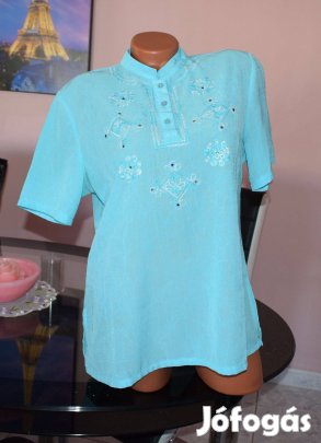 Világoskék női felső